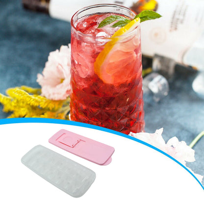 Silicone ice cube tray with easy-release feature, makes 14 cubes, stackable and safe for dishwasher.